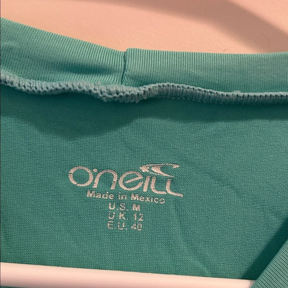 O'Neill Skins UV Block50+Short Sleeve Rashguard top Bodycon 91%nylon 9%spandex M